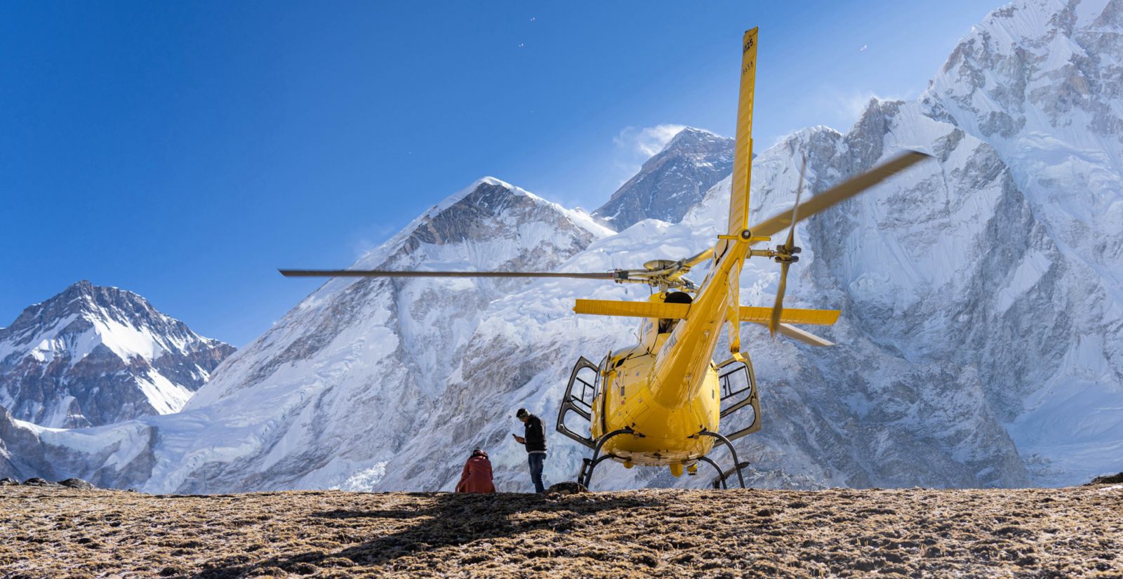 a yellow helicopter used for high-altitude operations in the Himalayas.